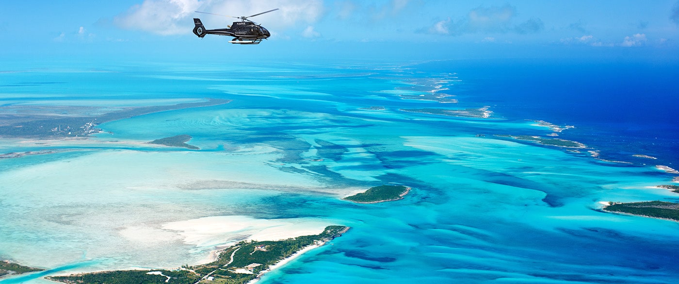 Helicopter flying over Polynesia & the Pacific Islands