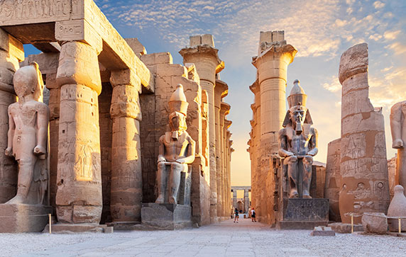 Luxor Temple courtyard and the statues of Ramses II, Egypt 
