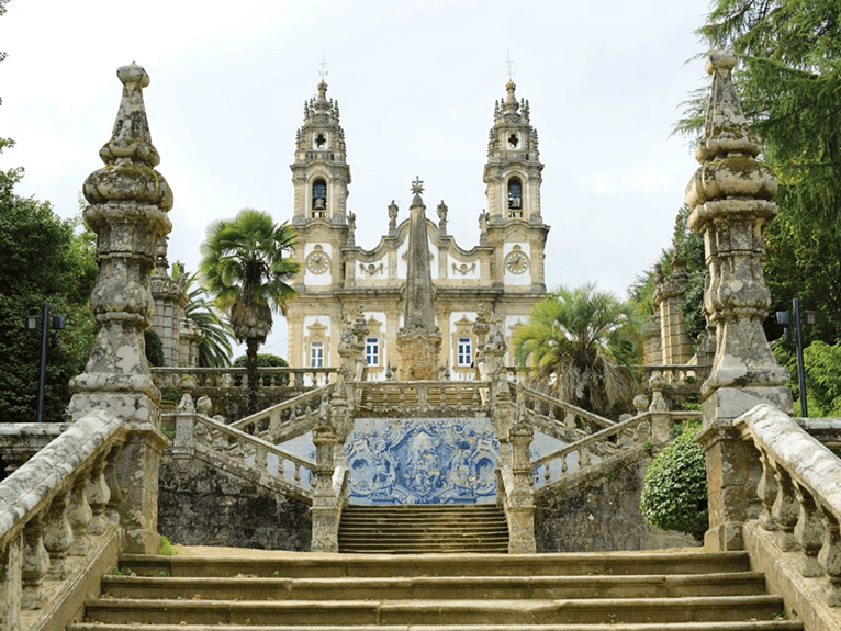 A series of steps ascending towards the historic Our Lady of Remedies Church, in the town of Lamego, Portugal. 