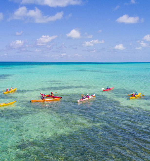 People kayaking in the Great Barrier Reef, Queensland Australia