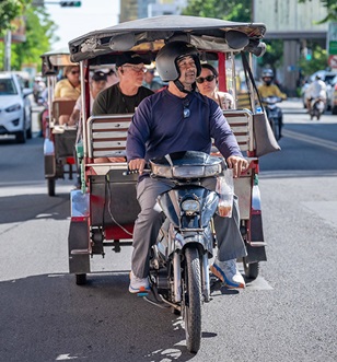 Guests enjoying a tuktuk ride