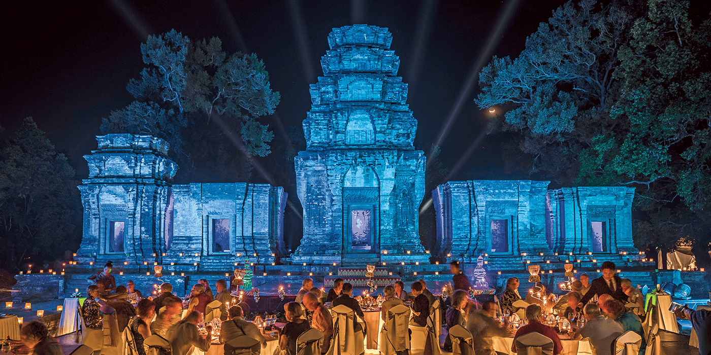 Scenic guests enjoying dinner at Angkor temple