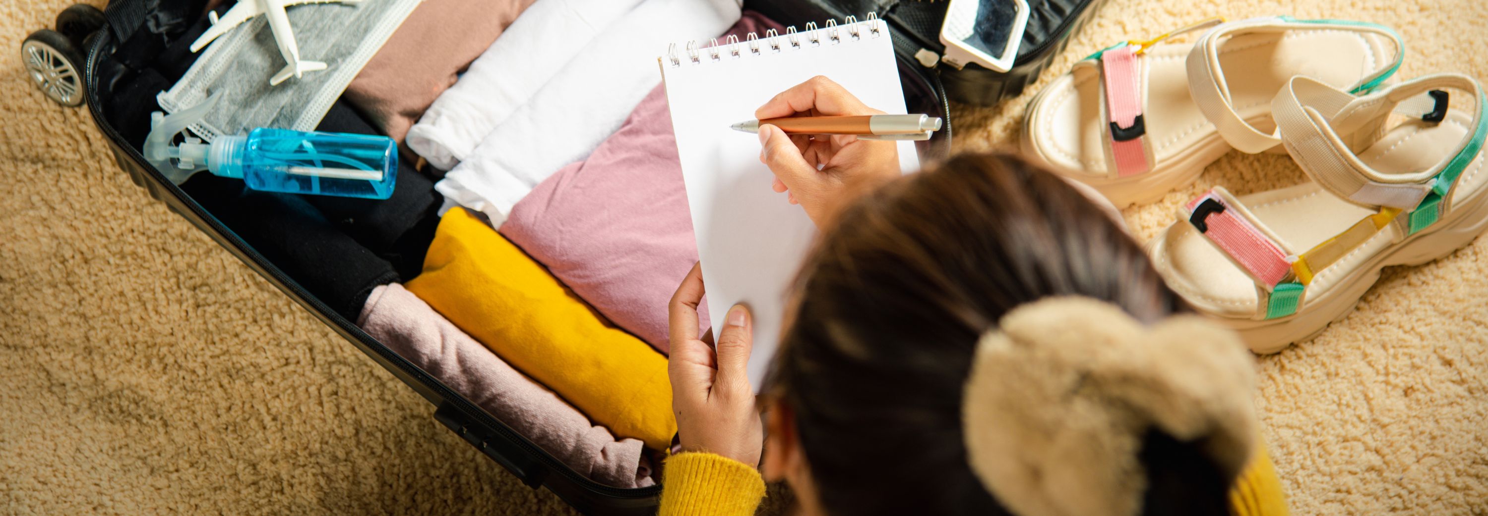 Making check list of things to pack for travel