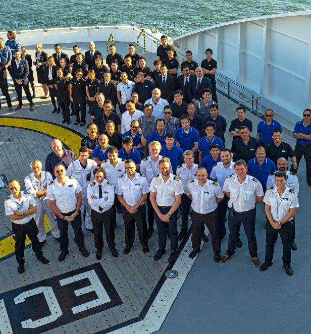 Scenic Eclipse crew team gathered on deck