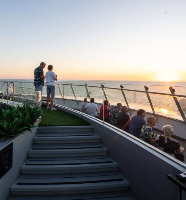 Guests watching the Kimberley sunset from the Scenic Eclipse II Sky Deck