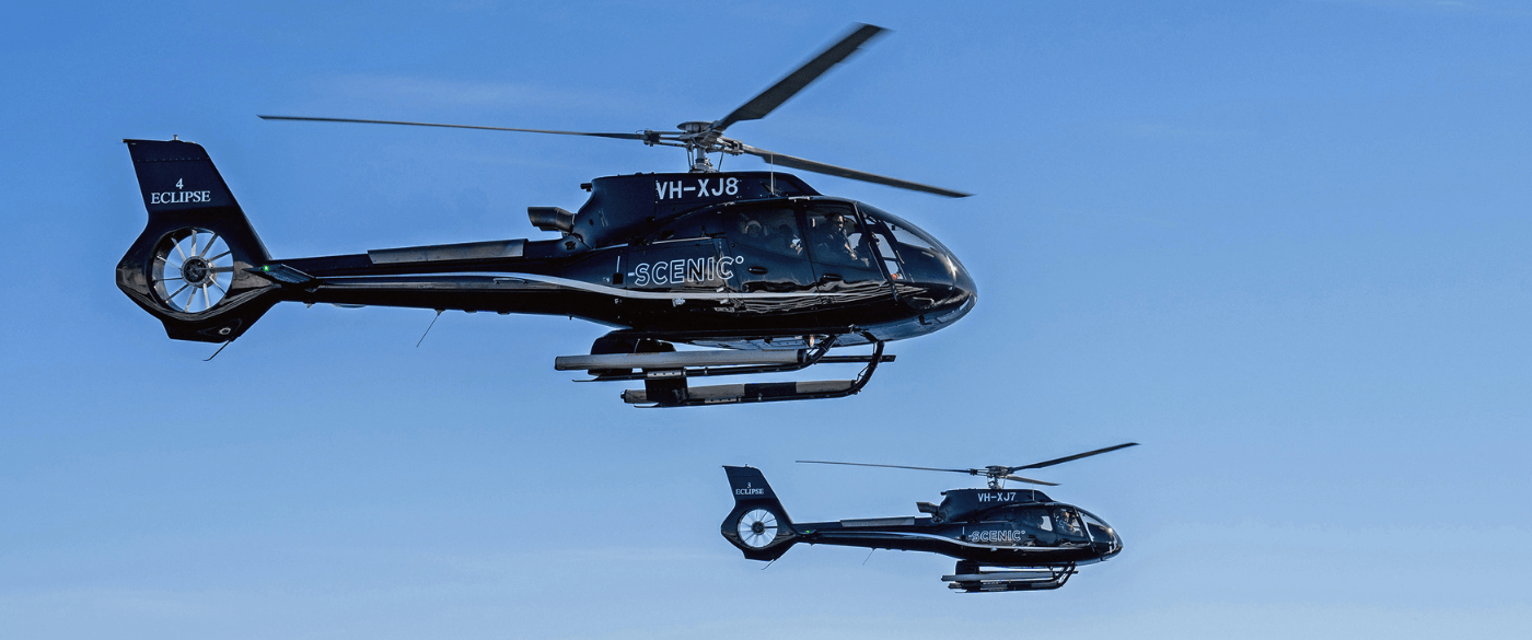 Scenic Helicopters flying over Ross Sea, East Antarctica An unrivalled view from above with two on board helicopters