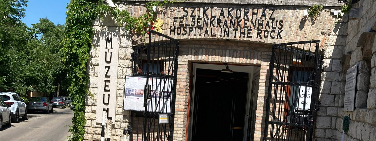 Street opening to Hospital in the Rock Nuclear Bunker Museum with iron gates